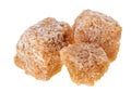 Three brown lump cane sugar cubes Royalty Free Stock Photo