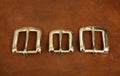 Three buckles on leather Royalty Free Stock Photo