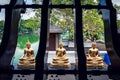 Three Buddha statues in front of Seema Malaka temple, Colombo