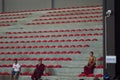 Three buddhist monks in purple clothes