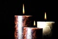 Three burning candles