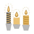 Three Burning Candles in Racks on White Royalty Free Stock Photo