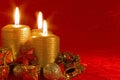 Three burning Christmas candles Royalty Free Stock Photo