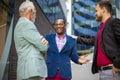 Three business men talking. Royalty Free Stock Photo