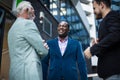 Three business men talking Royalty Free Stock Photo