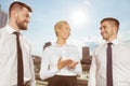 Three business partners having conversation Royalty Free Stock Photo