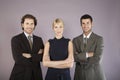 Three Business People With Arms Crossed Royalty Free Stock Photo