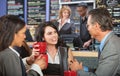 Three Business People in Bistro Royalty Free Stock Photo