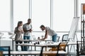 Corporate business portraits of real life business teams. Co-workers discussing their ideas Royalty Free Stock Photo