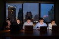 Three businessman and two businesswoman working with computer overtime at night Royalty Free Stock Photo
