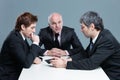Three businessmen having a serious discussion Royalty Free Stock Photo