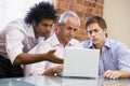 Three businessmen sitting