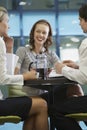 Three Businesspeople During Coffee Break Royalty Free Stock Photo