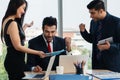 Three businesspeople having business discussion in meeting and show good feeling of confident and success in office Royalty Free Stock Photo