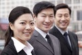 Three businesspeople outdoors Royalty Free Stock Photo