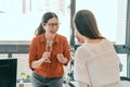 Three businesswomen enjoy the girls talk Royalty Free Stock Photo