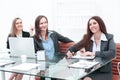 Three Businesswomen Meeting Around Table In Modern Office Royalty Free Stock Photo