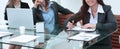 Three Businesswomen Meeting Around Table In Modern Office Royalty Free Stock Photo