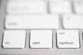 Three buttons close up computer white keyboard and others blur keys, function, control and option button, use for command action Royalty Free Stock Photo