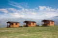 Three cabins against blue sky Royalty Free Stock Photo