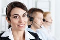 Three call centre service operators at work Royalty Free Stock Photo