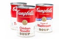 Three can tins of Campbell`s brand tomato soup, chicken noodle soup and cream of mushrooms soup