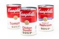 Three can tins of Campbell`s brand tomato soup, chicken noodle soup and cream of mushrooms soup