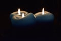 Three Candle lights in darkness Royalty Free Stock Photo