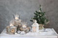Three candles and Christmas tree Royalty Free Stock Photo