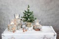 Three candles and Christmas tree Royalty Free Stock Photo