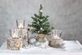 Three candles and Christmas tree Royalty Free Stock Photo