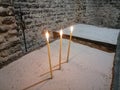 Three candles in the church. Symbol of life, hope and death