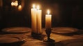 Three Candles Illuminate A Table Setting Royalty Free Stock Photo
