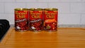 Three Cans of Hormel Chili