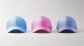 Three caps in pastel colors lined up side by side Royalty Free Stock Photo