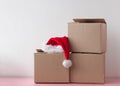 Three cardboard boxes at the top is the red hat of Santa Claus Royalty Free Stock Photo