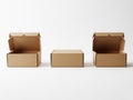Three cardboard boxes in various sizes isolated on white background Royalty Free Stock Photo