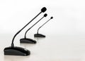 Three cardioid gooseneck microphones for conference and desktop systems in a row