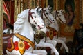 Three carousel horses