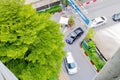 Three cars are turning left at the corner of the street beside The Mall department store Bangkapi, Thailand March 14, 2017