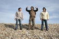 Three casual young men at the beach