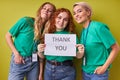 Three caucasian women say thanks to people participating in charity, volunteering Royalty Free Stock Photo