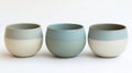 Three Ceramic Cups in Two Tone Pastel Colors Royalty Free Stock Photo