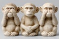 Three ceramic monkey figurines embody the \