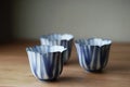 Three ceramic tea cup set
