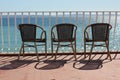 Three chairs in terace above colorful adriatic sea Royalty Free Stock Photo