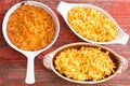 Three cheese macaroni in different clay pot Royalty Free Stock Photo