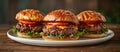 Three Cheeseburgers on Plate on Table Royalty Free Stock Photo