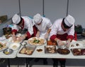 Three Chefs at a Cooking Competition