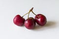 Three cherries as a metaphor for infidelity in a relationship Royalty Free Stock Photo